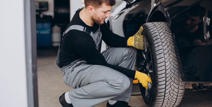 Mechanic performing tire repairs
